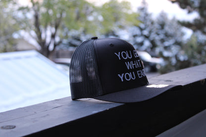YOU GET WHAT YOU EARN - Black trucker Hat