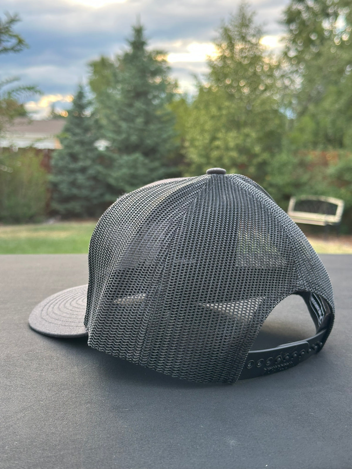 YOU GET WHAT YOU EARN - Black trucker Hat