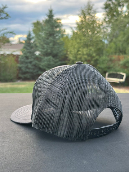 YOU GET WHAT YOU EARN - Black trucker Hat