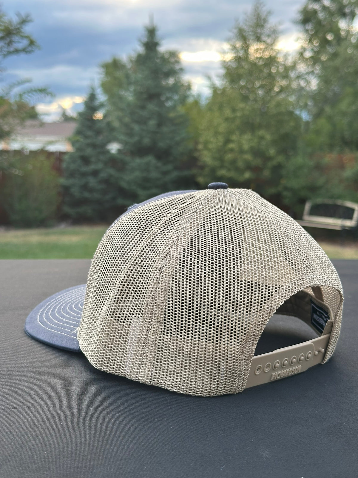YOU GET WHAT YOU EARN - Black trucker Hat
