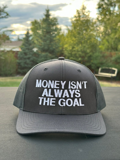 MONEY ISN’T ALWAYS THE GOAL - Black Trucker Hat