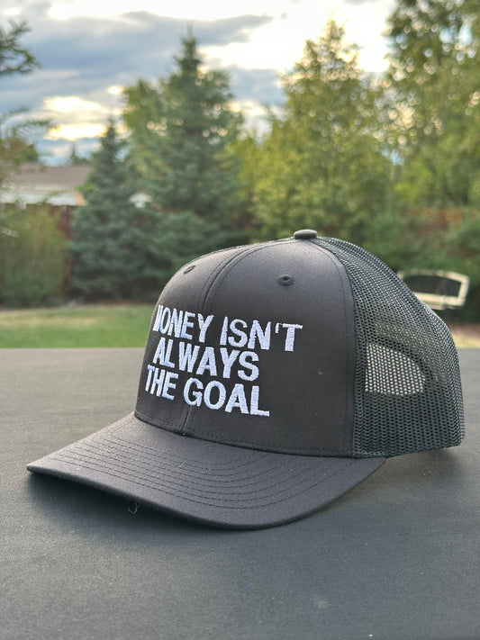 MONEY ISN’T ALWAYS THE GOAL - Black Trucker Hat