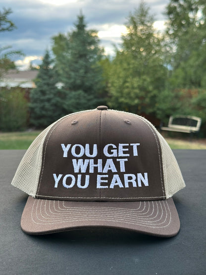 YOU GET WHAT YOU EARN - Black trucker Hat