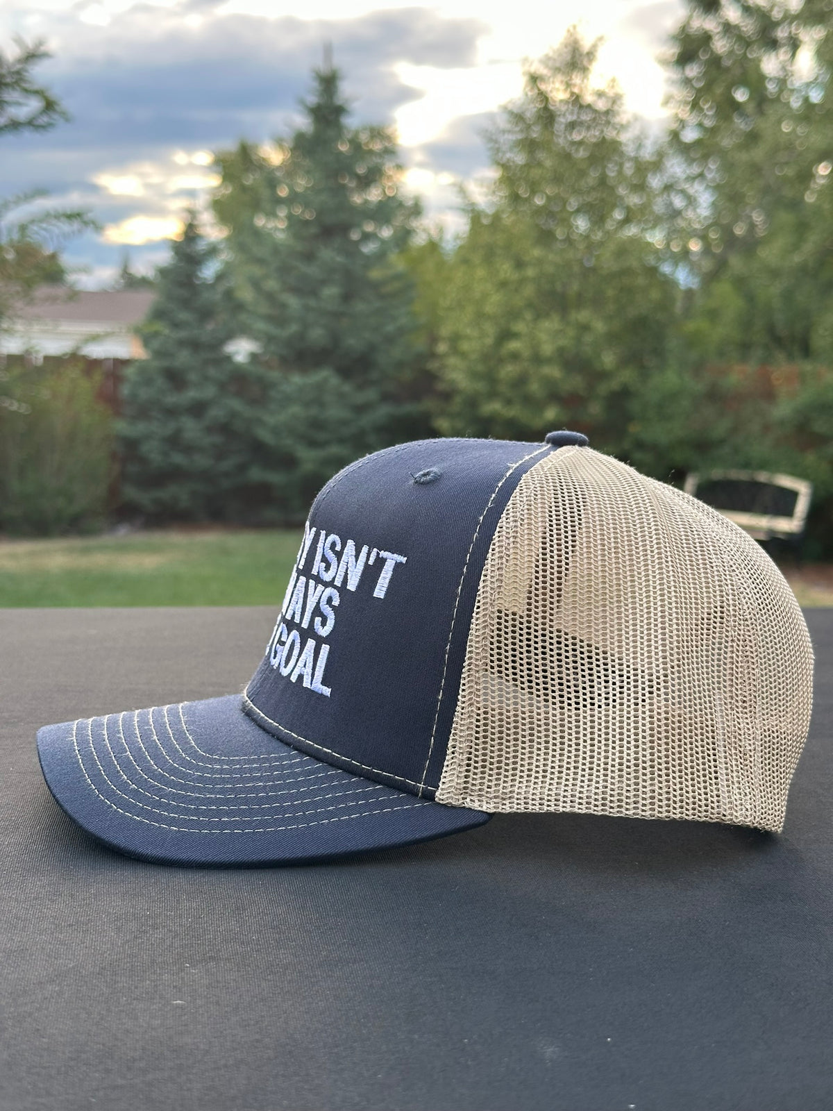 MONEY ISN’T ALWAYS THE GOAL - Black Trucker Hat